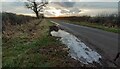 Rural road heading southwest towards Barney House