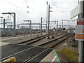 TQ4487 : View of railway tracks and overhead cables, Ilford train maintenance depot by David Hillas
