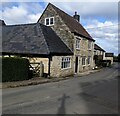 Houses alongside The Street, Coaley, Gloucestershire