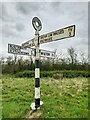 Direction Sign – Signpost at the Woodrow crossroads