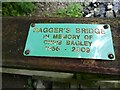 Plaque on the wooden footbridge for Chris Bagley