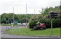 Mowing the centre of the roundabout at the junction of Leeds Ring Road (A647) and Bradford Road (B6157), Stanningley