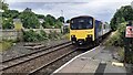 A Class 150/1 Sprinter number 150150 approaches Clitheroe Station