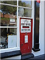 Old post box sign in Milverton