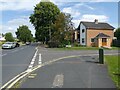 Junction of Redhouse Road and The Meadway