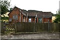 Elmsted: Automatic telephone exchange whose outside appearance suggests it is disused when it is not