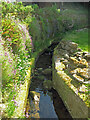 Leat feeding the wheel of former water mill at Dipton Mill