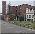 Fenced-off former New Inn fire station, Torfaen