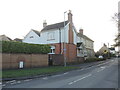 Old milestone and new housing