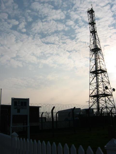 Signal mast and razor wire