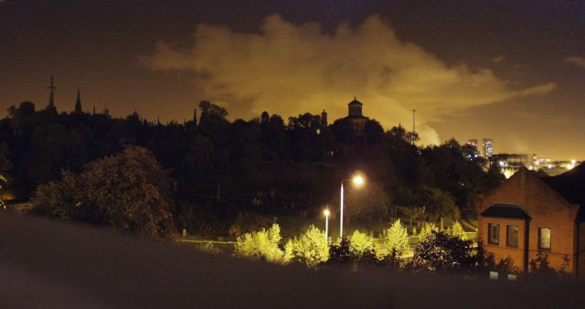 the Glasgow Necropolis by night.