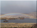 NM6895 : Rainbow over Loch an Nastairie by James Bentall