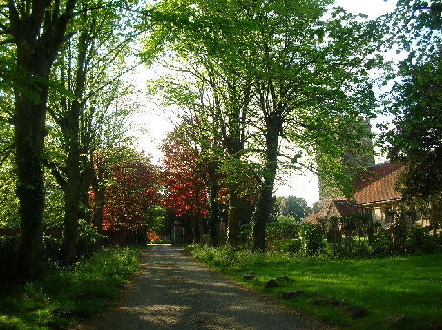 Milton Church with driveway to Manorhouse