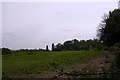 Looking over farmland to Glascombe Hanger