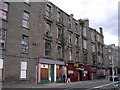 NO4131 : Derelict tenements and shops in Dundee's inner city by Val Vannet