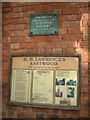 Sign by the door of The Sun Inn, Eastwood, Notts.