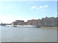 River Thames at Wapping - warehouse apartments and sightseeing boats