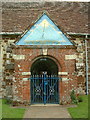 SU1408 : Entrance to Saint Mary's Church, Ellingham by John Smitten
