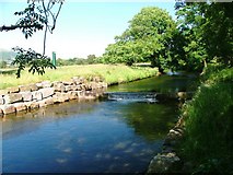 NY3224 : Weir on the River Gleneramackin by Mick Garratt