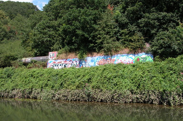 Urban graffiti beside the River Avon.