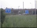 Direction signs on the motorway