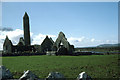 M4000 : Kilmacduagh, County Galway; the round tower leans (Pisa's is not unique). by Dr Charles Nelson