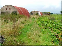 SE3779 : Huts by the side of the A61 by Mick Garratt