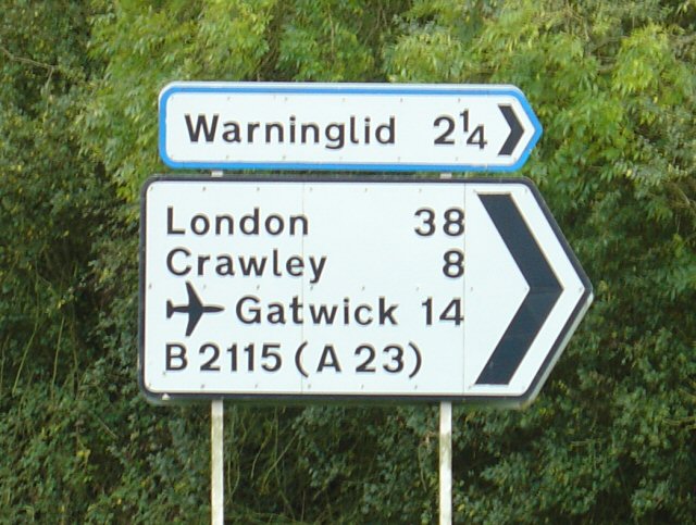 Road sign at Slough Green Junction showing destinations along Slough Green Lane.