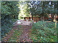 Gate at junction of track and South Lodge Road, Hersham