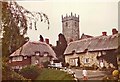 SZ5281 : Cottages at Godshill with church in background. by Christine Matthews