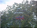 TM3569 : Peasenhall Sign by Geographer