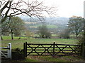 across farmland from Cockley Hill