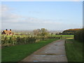 Concrete road near Coney Hill Farm with Aylesbury in the background