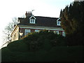 The Farmhouse Behind The Hedge