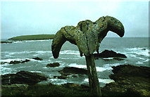 HY2428 : Whale's vertebra on a post. by Peter Ward