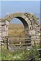 Remains of barn doorway and moorland