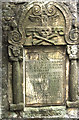 Tombstone of John Geddes, glover,  in Elgin Cathedral.