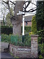 Guide post outside The Hall, Guilden Sutton.