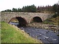 NH6677 : Looking down stream at the Strath Rory Bridge by Donald H Bain