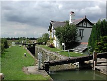 SP9114 : Lock and cottage on Aylesbury Arm of Grand Union by George Mahoney