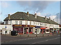 TQ1373 : Shops in Nelson Road, Whitton by David Hawgood
