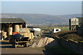 Track through farm with the Mendips in the background