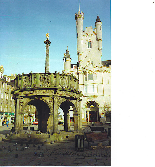 The Mercat Cross and the Salvation Army Citadel.