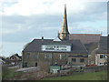 Spire behind Dog & Partridge pub