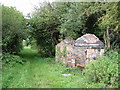 Course of disused railway and building