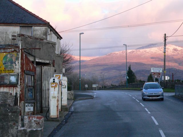 A Disused Filling Station with Elidir Fawr in the distance
