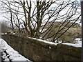 Snowy stone bridge