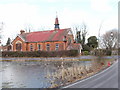 Pond and church, Mill Hill Village