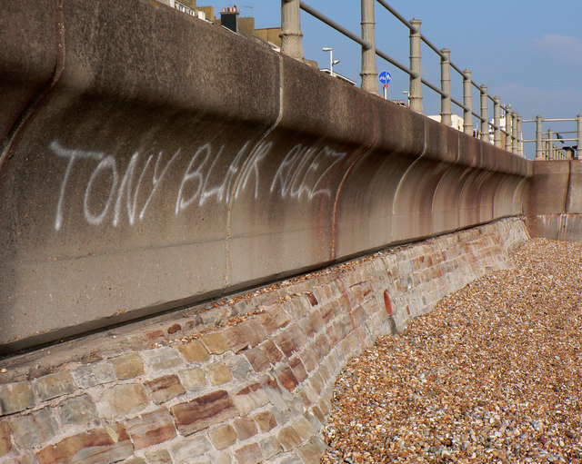 Sea defences with graffiti (ironic?)
