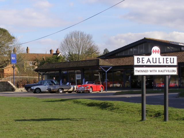 Beaulieu Garage and village sign, New... © Jim Champion :: Geograph